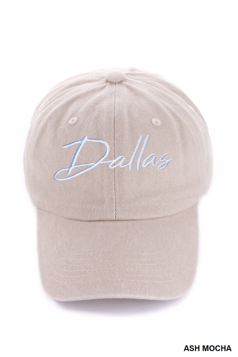 Beige cap with 'Dallas' embroidered on a white background