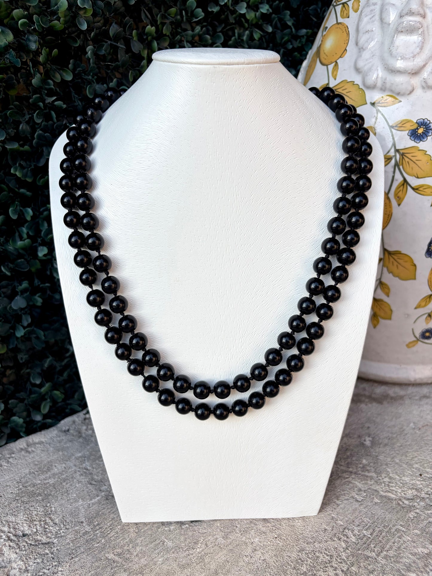 black beaded strand necklace. wear as single strand or loop it for layered look