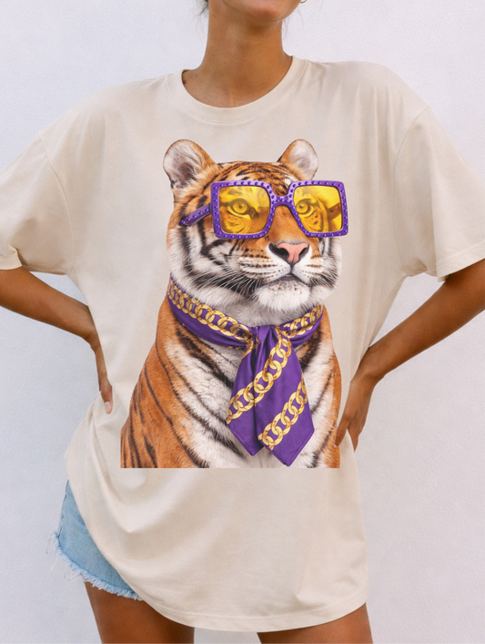  t-shirt with a tiger graphic design featuring sunglasses and a chain necklace. short sleeve, white tee, crew neck
