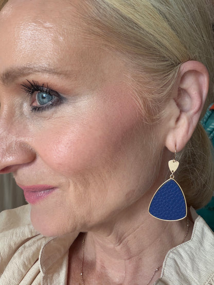 pair of royal blue geo dangle earrings with gold detail