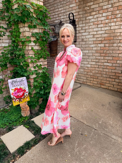 white short sleeve maxi dress with v neck and pink and coral floral design