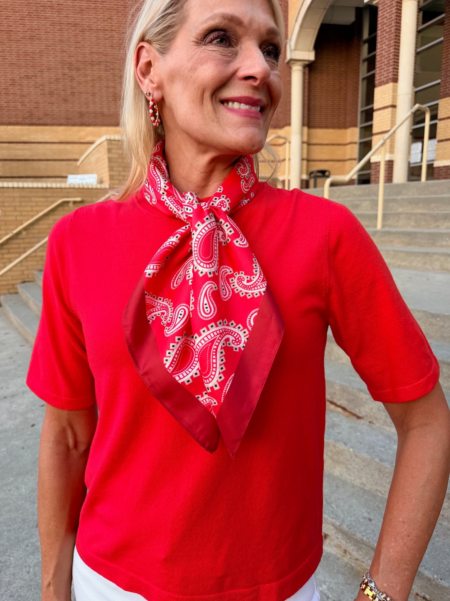 red and white paisley scarf, makes a great game day look