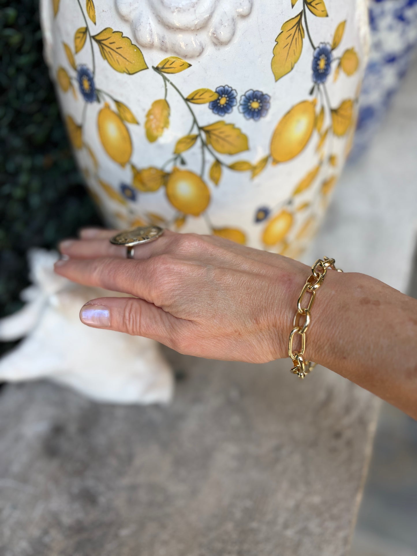 a gold link chain bracelet