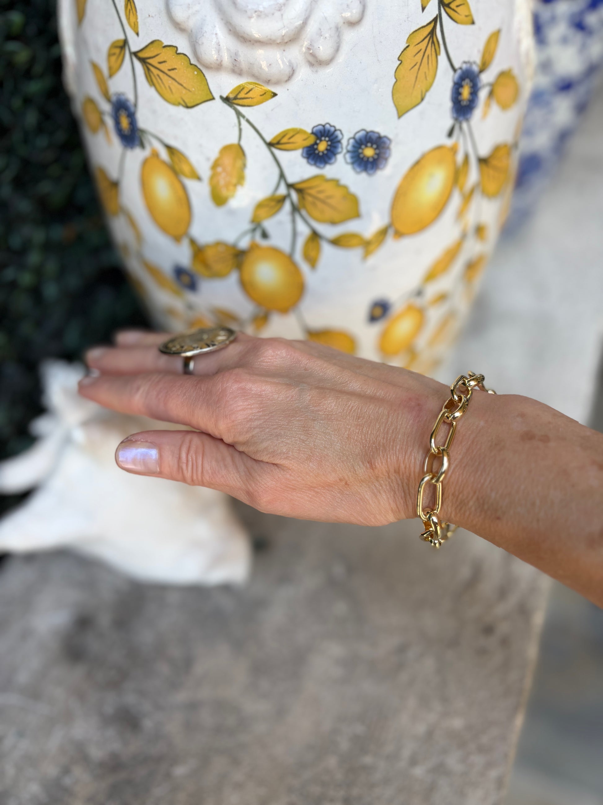 a gold link chain bracelet