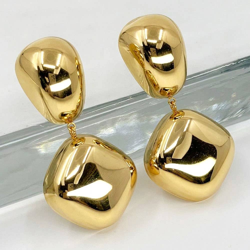 A pair of stainless steel gold dangle earrings 