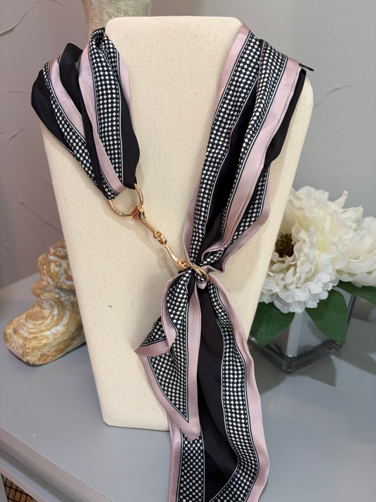 scarf in black, white, blush with black and white check design with gold horse-bit 