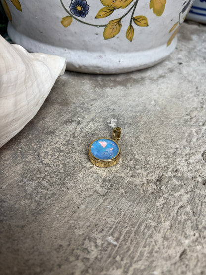 Round gemstone charm in light blue