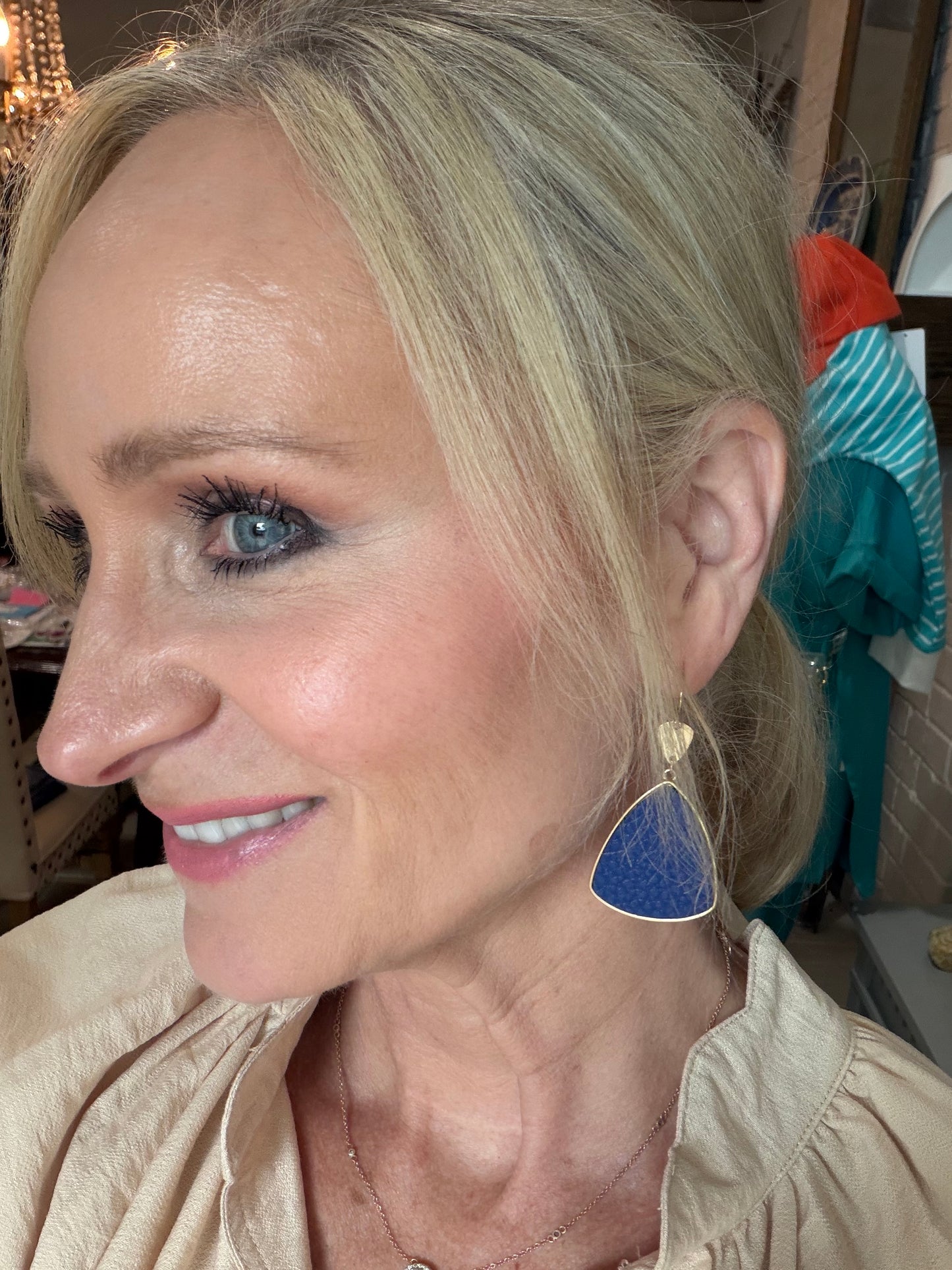 pair of royal blue geo dangle earrings with gold detail