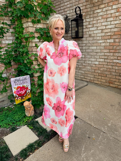 white short sleeve maxi dress with v neck and pink and coral floral design