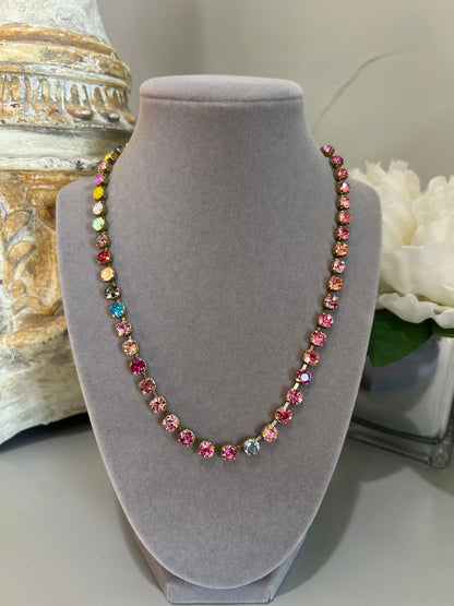 Tova oakland custom necklace with multicolored pink tone gemstones on gold setting