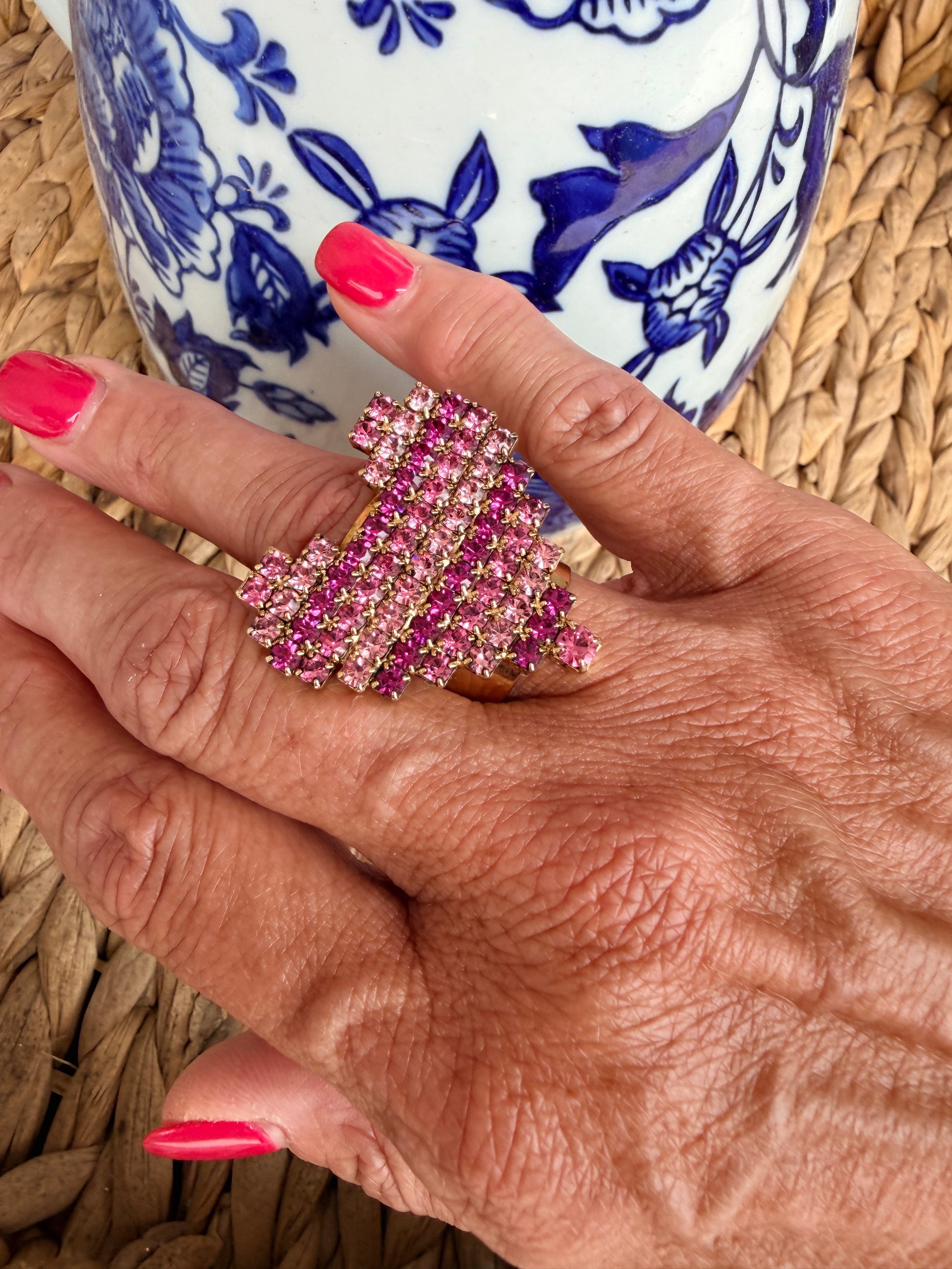 pink statement ring with pink on pink rhinestones in a row.