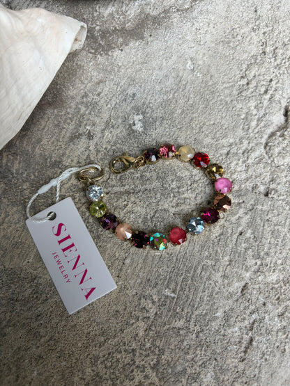 multicolored glass gemstone bracelet with a gold clasp closure