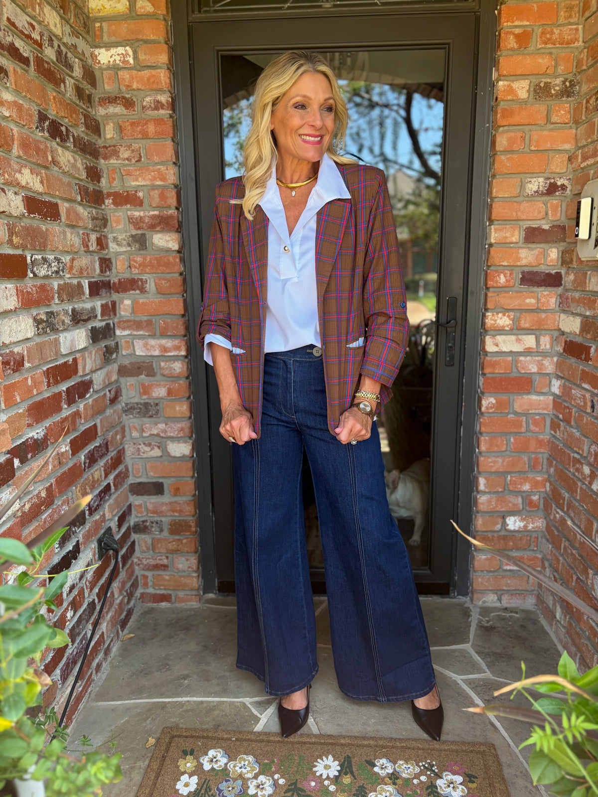 brown plaid, cotton blazer with red and royal blue details. one size that synced in back to tailor. Light blue stripe detail on back of collar and comes with gold and rhinestone brooches. 