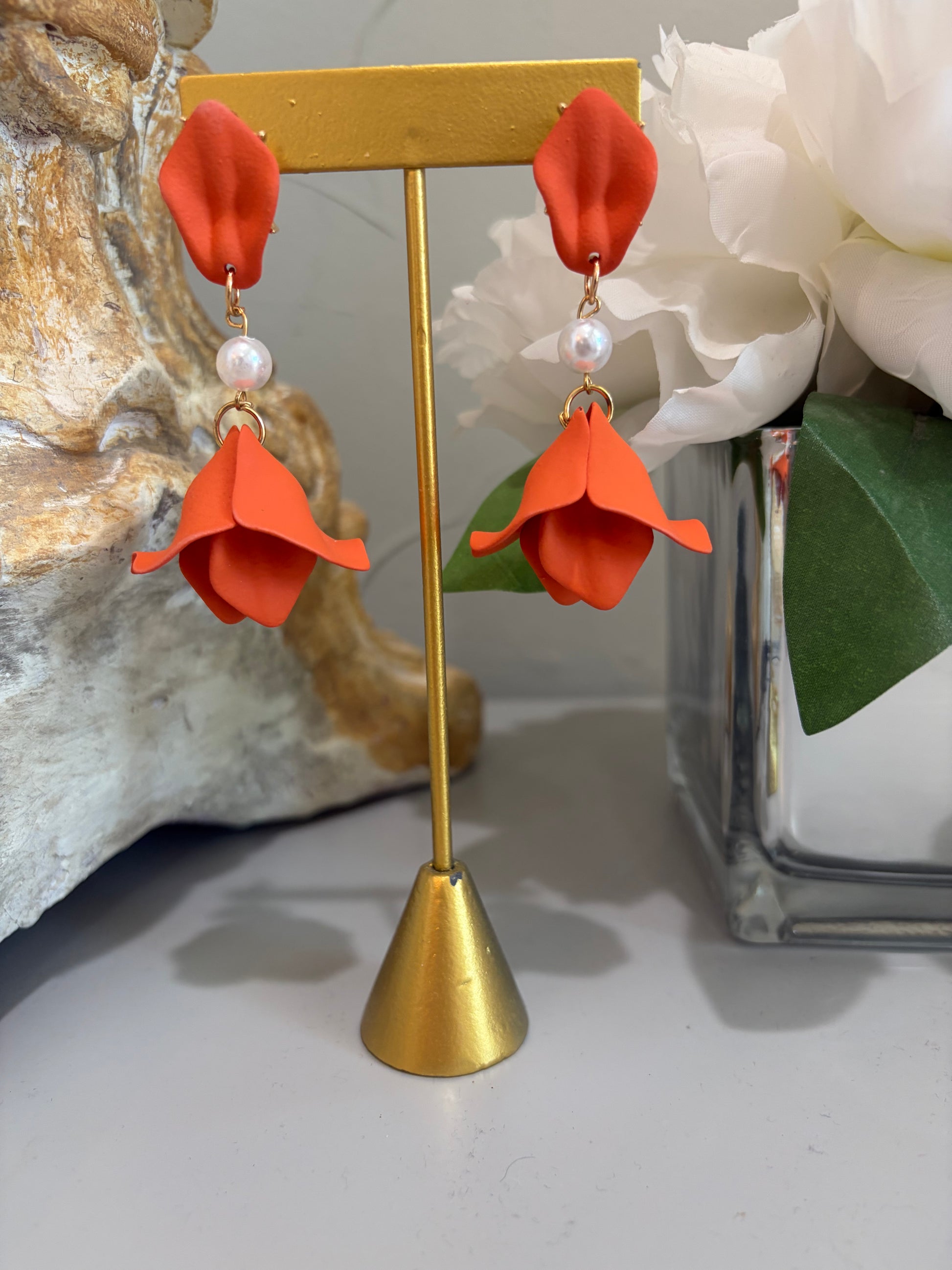 orange dangle earring with pearl accent