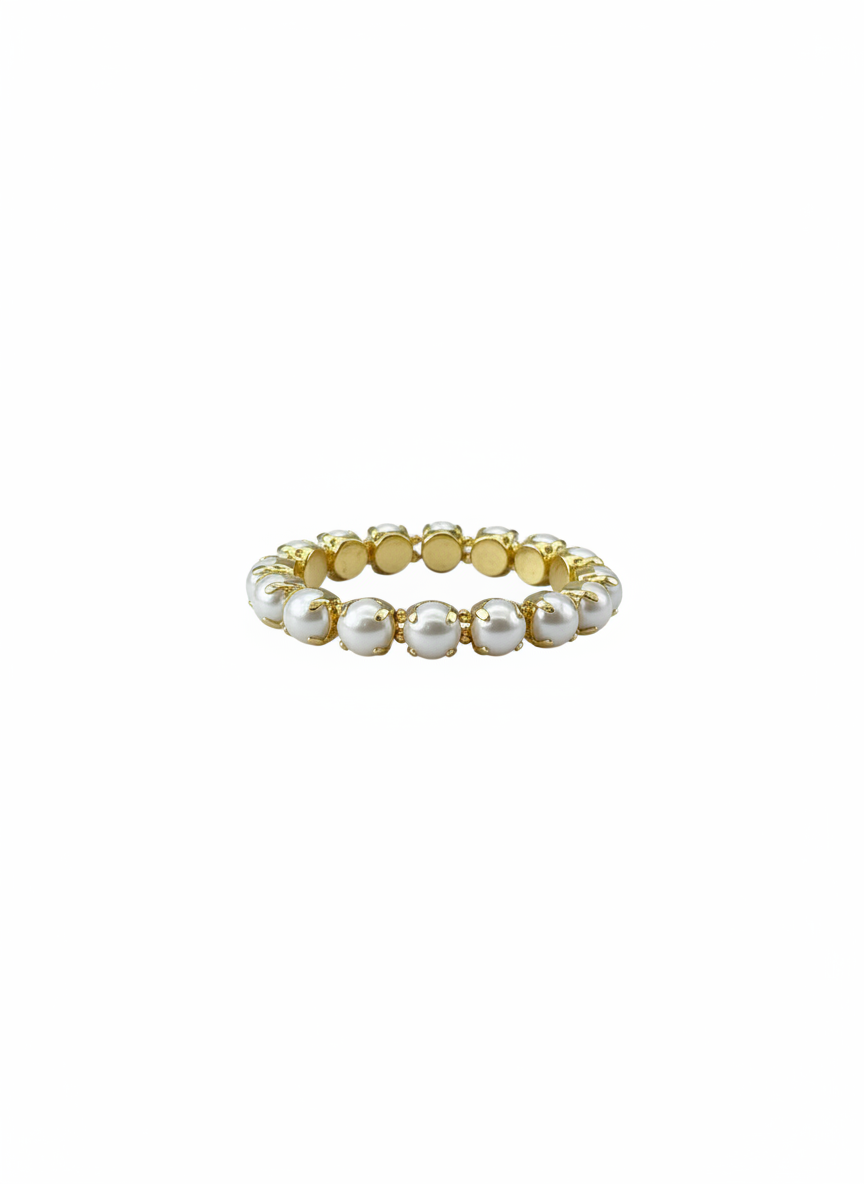 A delicate gold plated water resistant stretch bracelet  featuring a row of small, lustrous white  pearls, shown against a solid white background.
