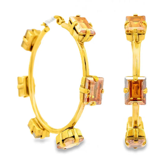 Gold hoop earrings with rectangular amber-orange gemstones, shown on a plain white background with one earring viewed from the side and the other from the front.