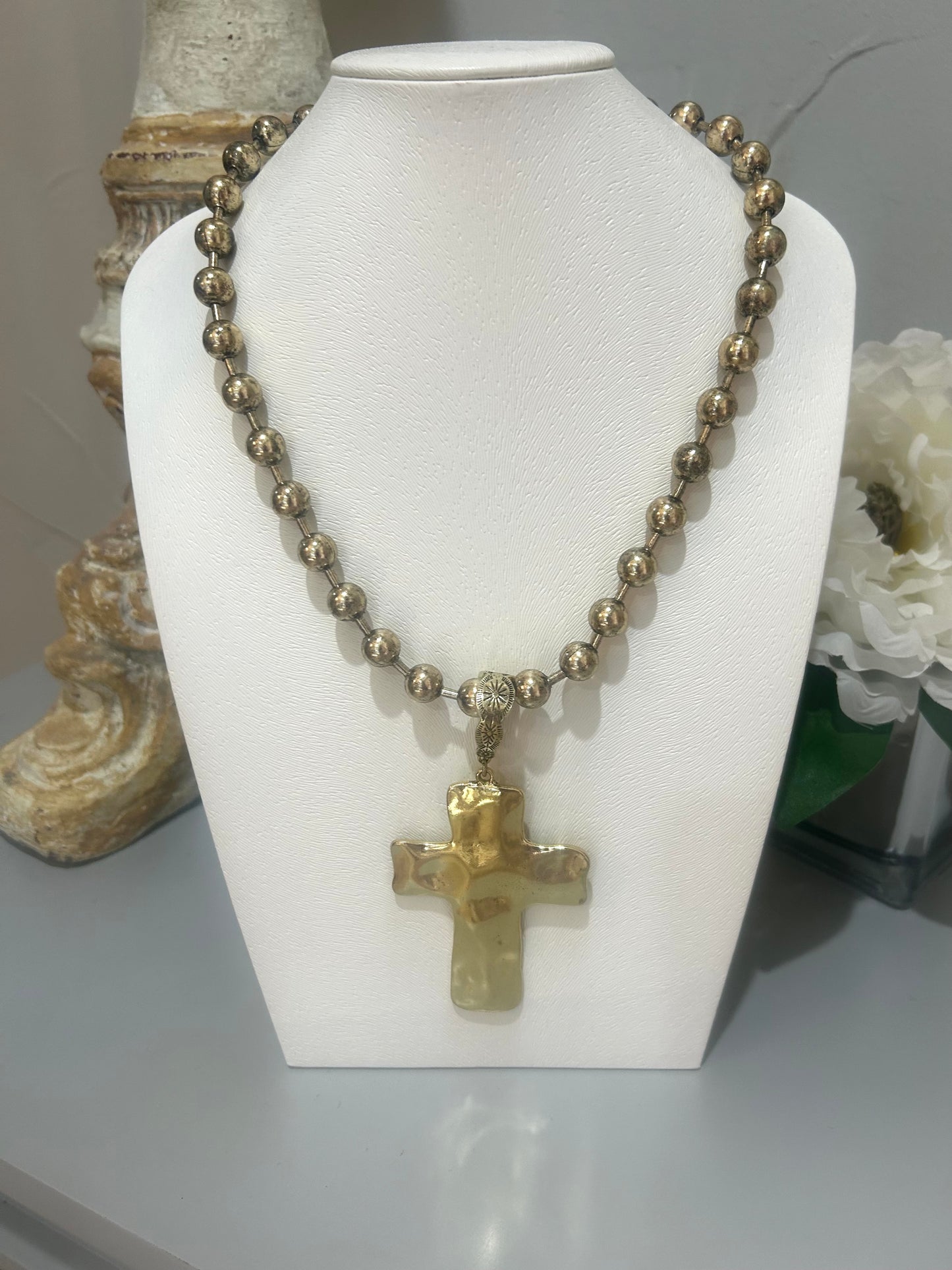 gold bead necklace with hammered gold cross pendant