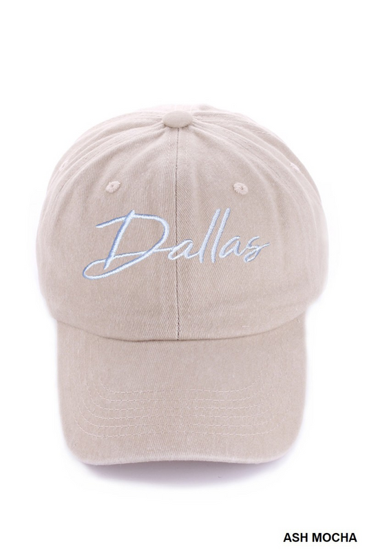 Beige cap with 'Dallas' embroidered on a white background