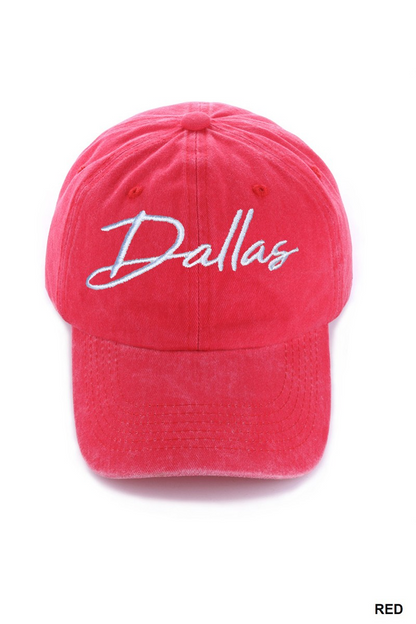 Red cap with 'Dallas' embroidered on a white background