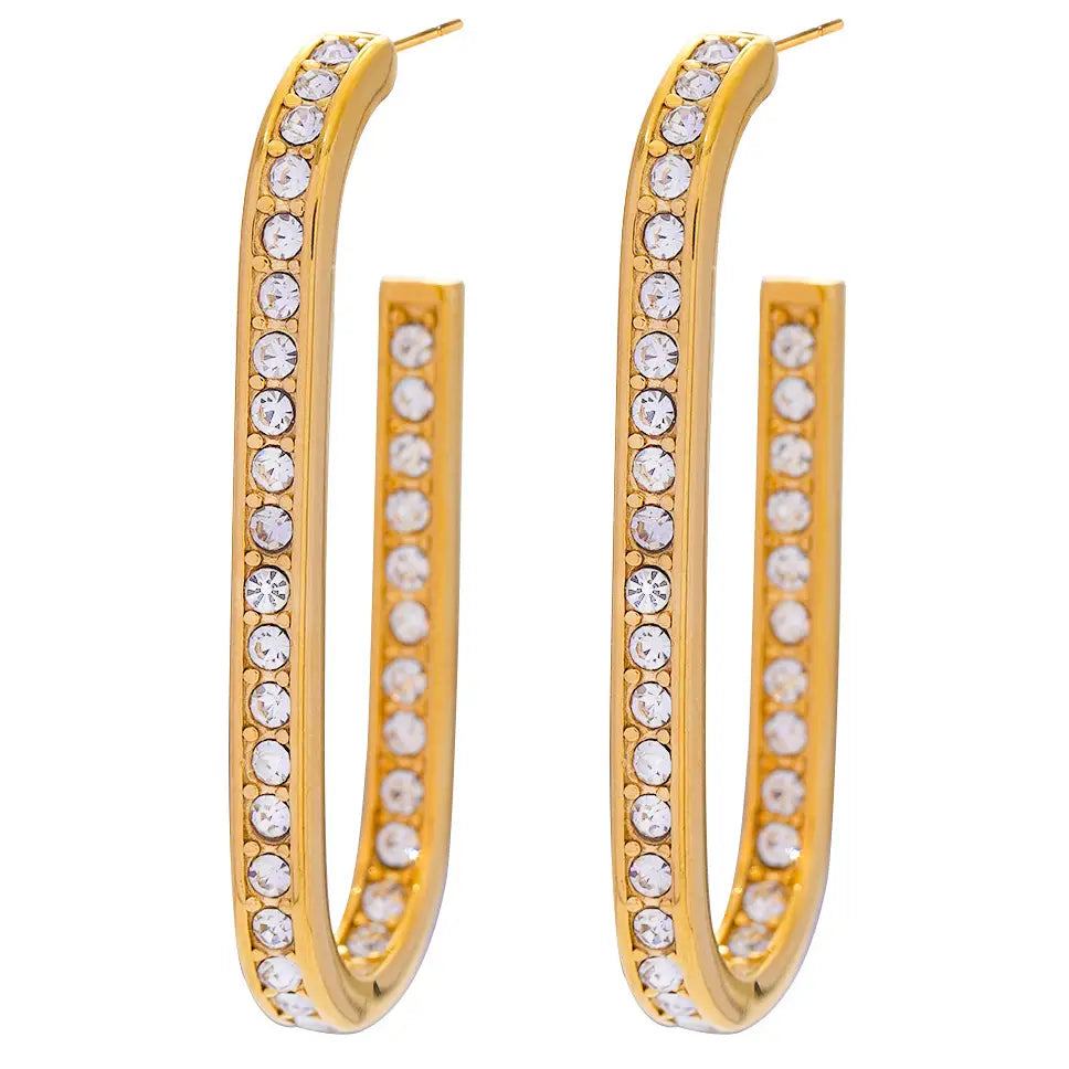 A pair of gold hoop earrings embellished with clear round-cut rhinestones, 