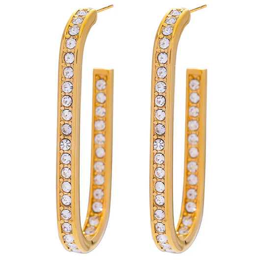 A pair of gold hoop earrings embellished with clear round-cut rhinestones, 
