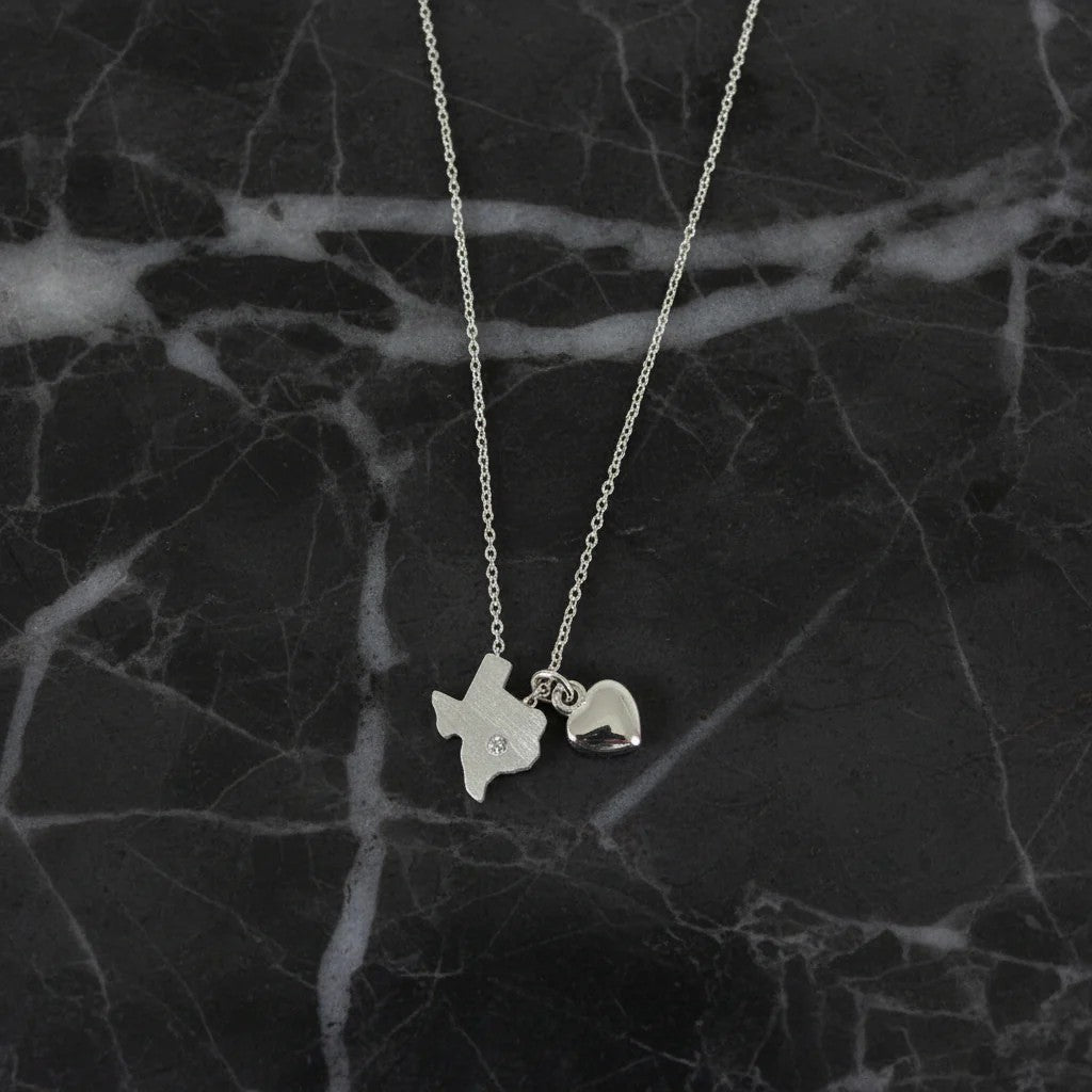 silver texas charm necklace with a silver heart 