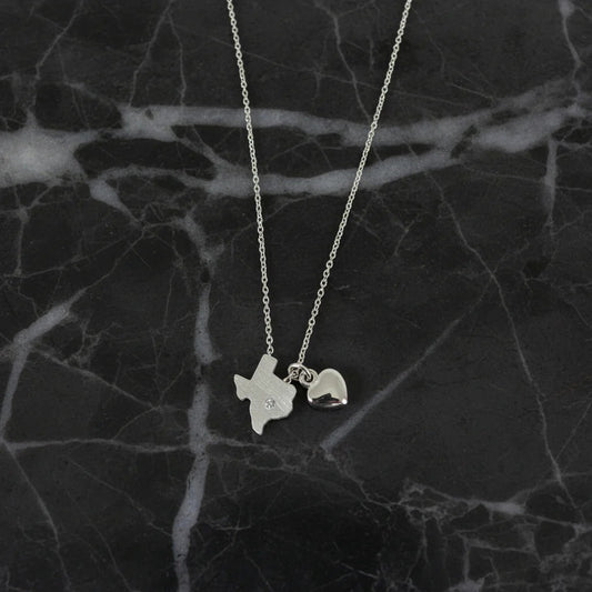 silver texas charm necklace with a silver heart 