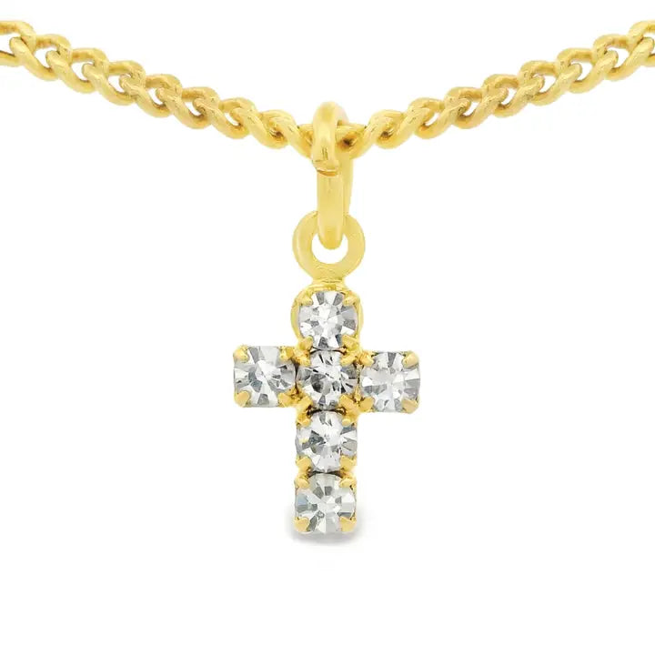 A tova gold cross pendant necklace featuring four clear round-cut gemstones, suspended from a gold chain on a plain white background.