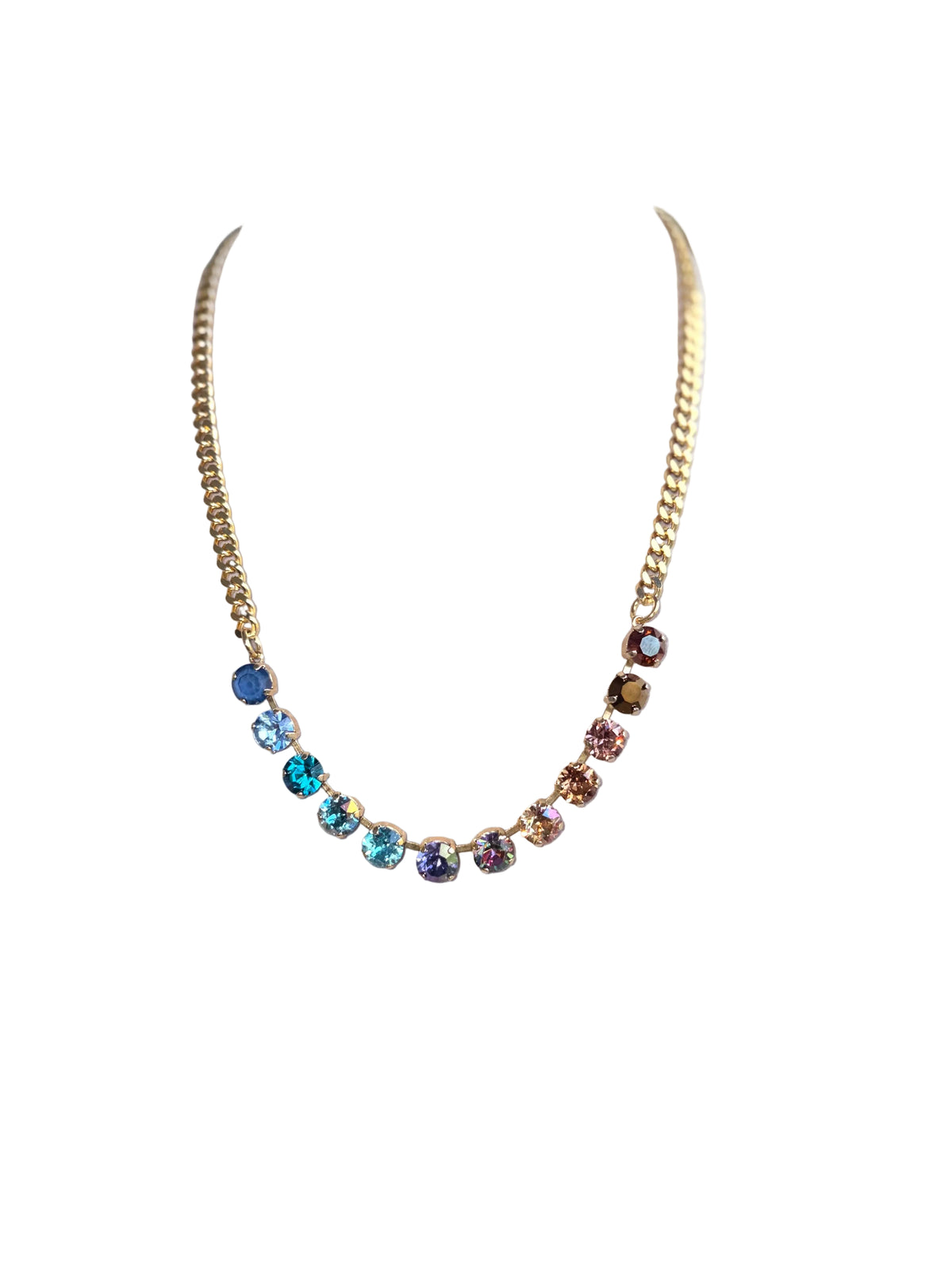 Tova mini oakland necklace that is 22k gold antique plated link chain with swarovski crystals in blues to topaz to chocolate tones. midnight express